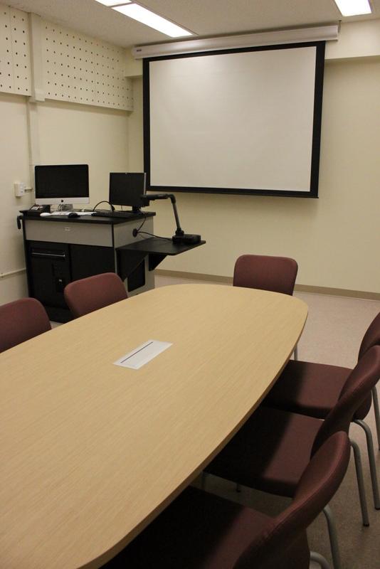 Students should be seated at the conference table